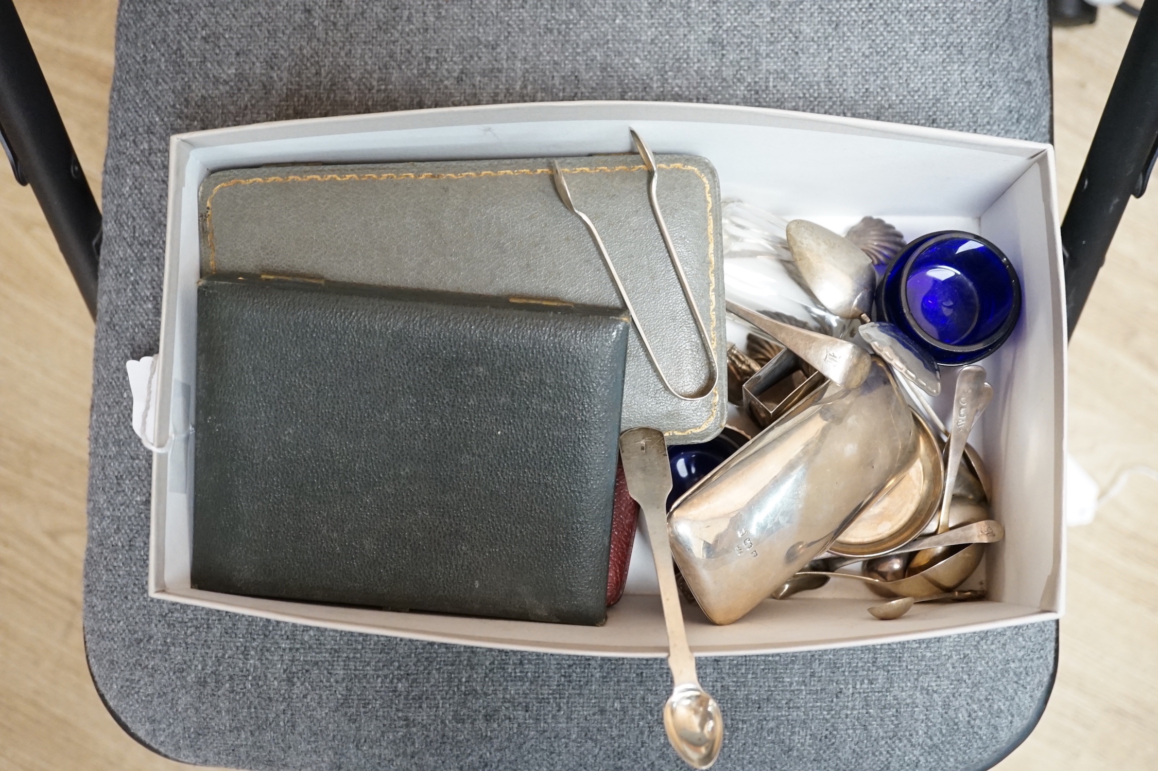 A collection of sundry small silver including a Victorian mustard, flatware including cased sets, cream jug, pair of Georgian salts, salts bottle, etc.